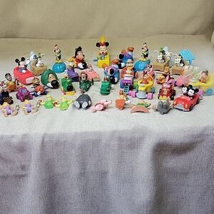 Huge lot of Disney small vehicles and figures